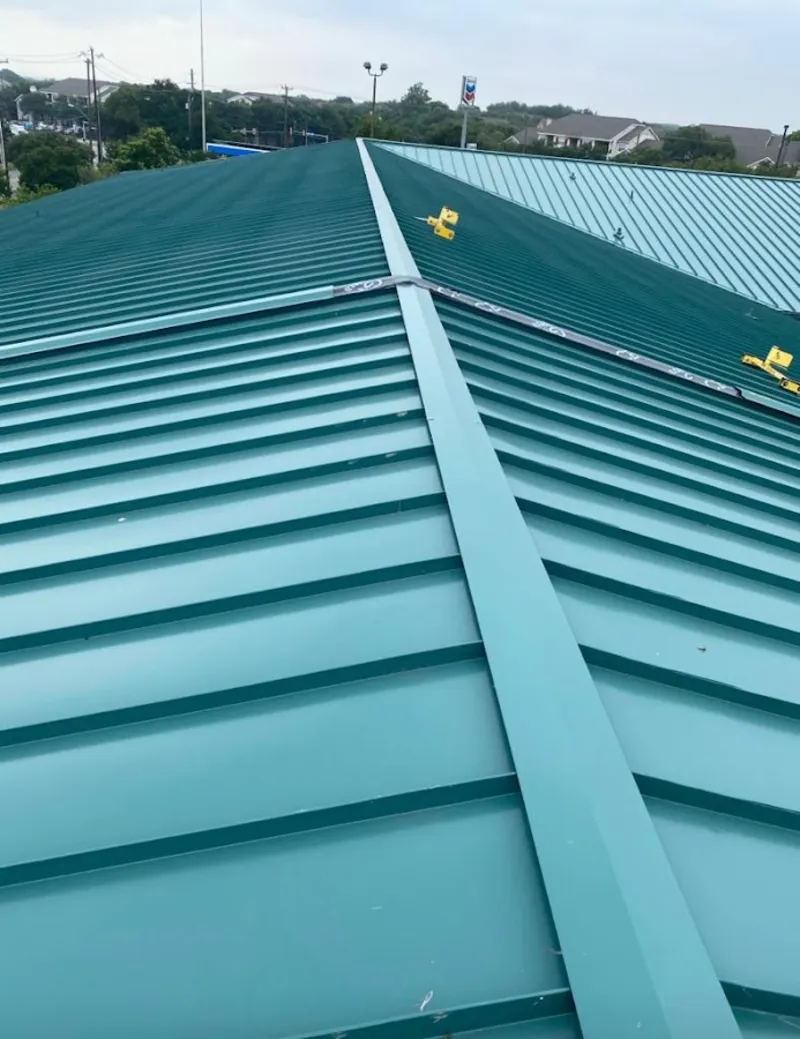 Green commercial metal roof ridge and valley for Metal Roof Repair in Homeland Park